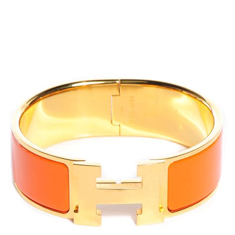 hermes orange clic clac bracelet|Hermes orange enamel bangle bracelet.